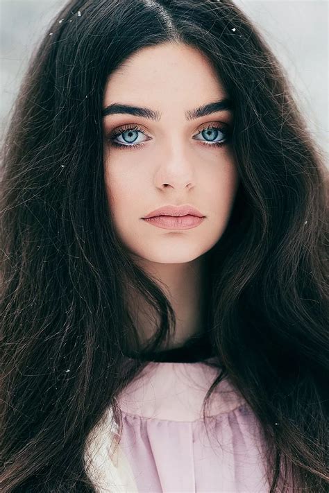 Rare Beauty: Black Hair With Blue Eyes Explained